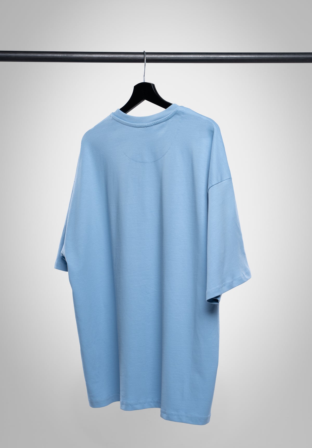 Du bist gemutet Oversize Tee Light Blue auf dem Bügel von hinten #Farbe_Blau